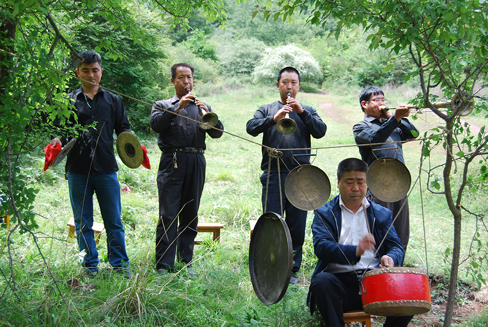 1513303923299458.jpg 图5为正在演奏武山唢呐.JPG