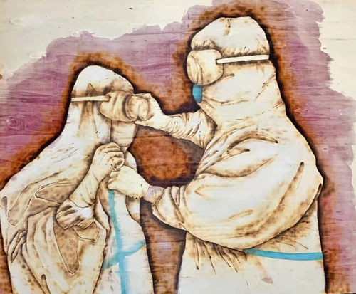 作者:刘静娴 烙画作品《护》.jpg 作者:刘静娴 烙画作品《护》.jpg